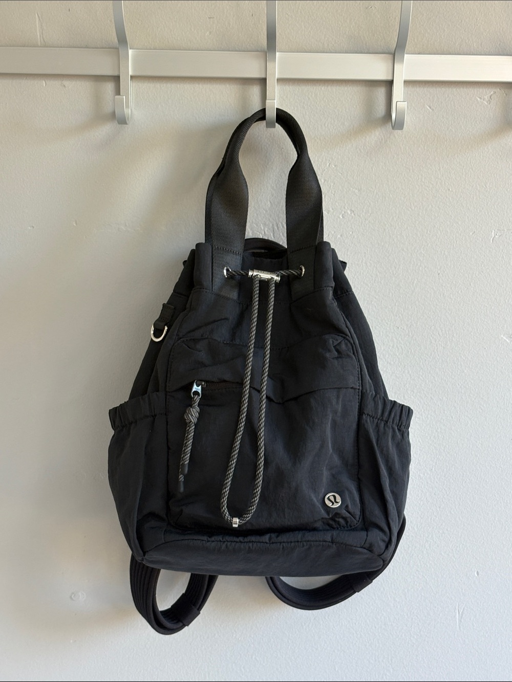 lululemon athletica Black Drawstring Backpack with Front Zip Pocket